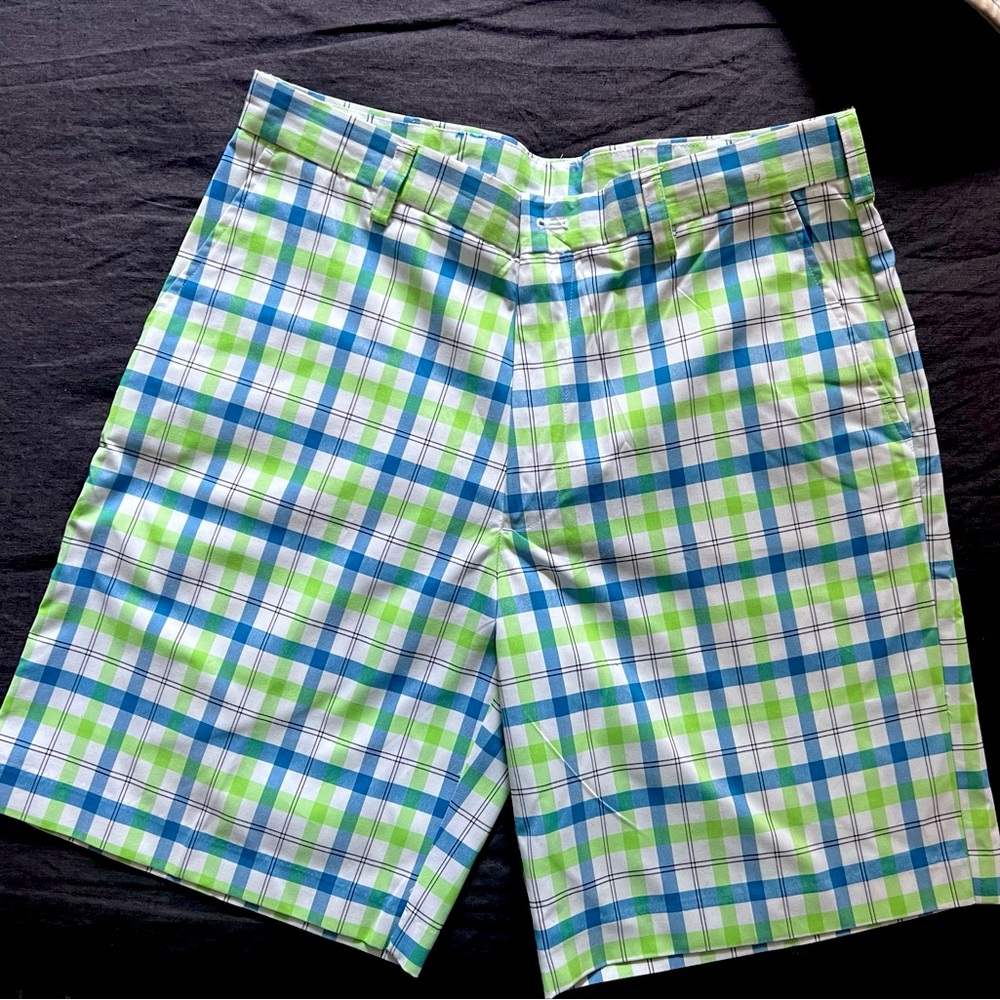 Men’s Izod golf shorts.. I don’t think they were ever worn